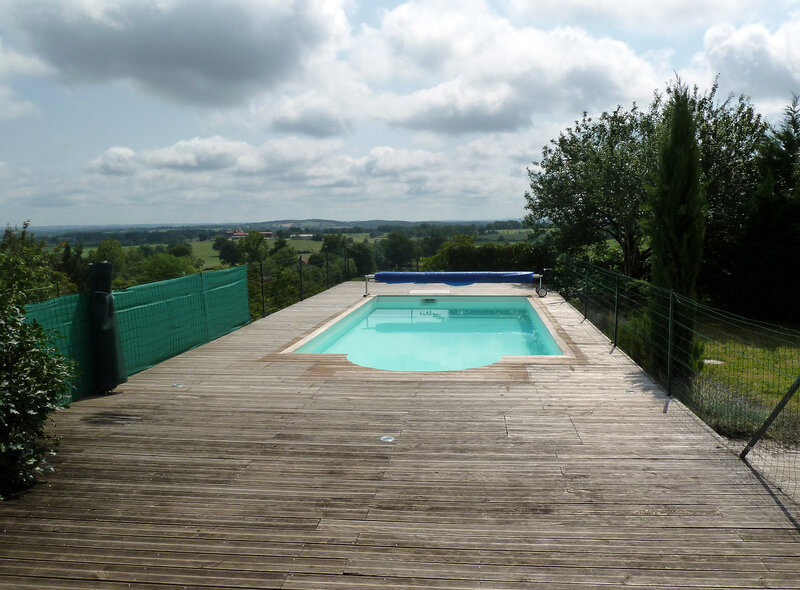 Swimming pool with terrace and the view