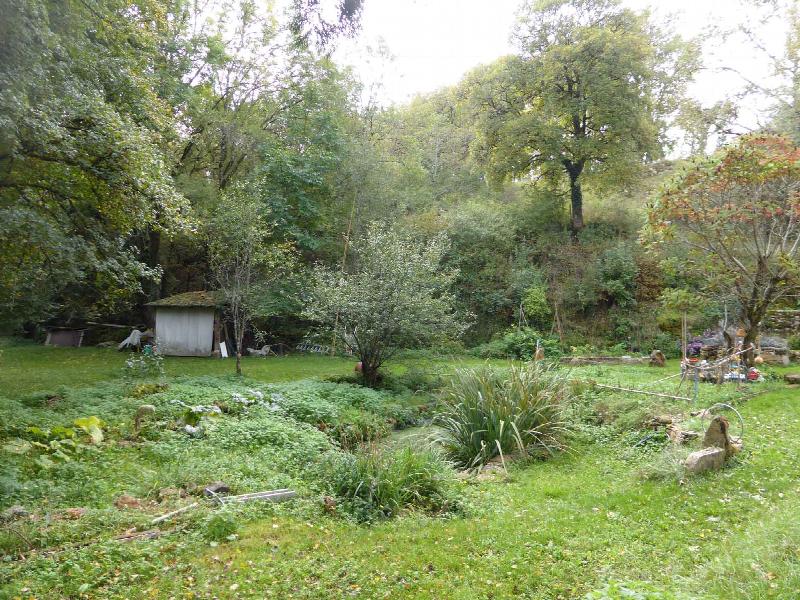 Garden of 1800 sqm with a stream at the border